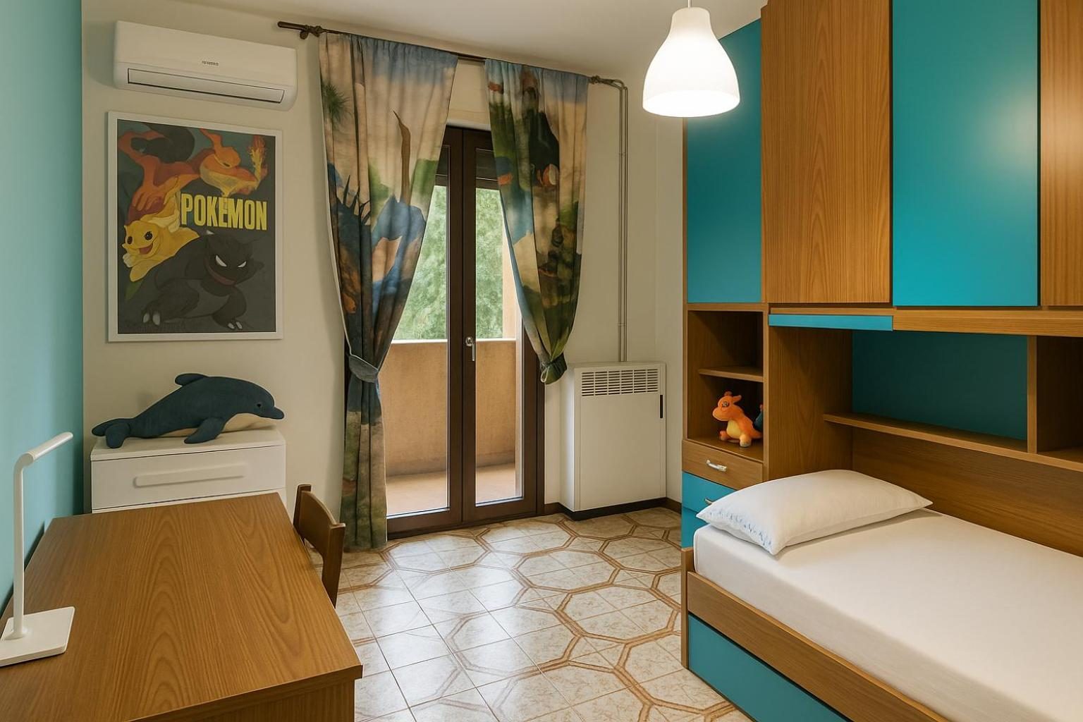 The second room, with a single bed, a desk and blue walls