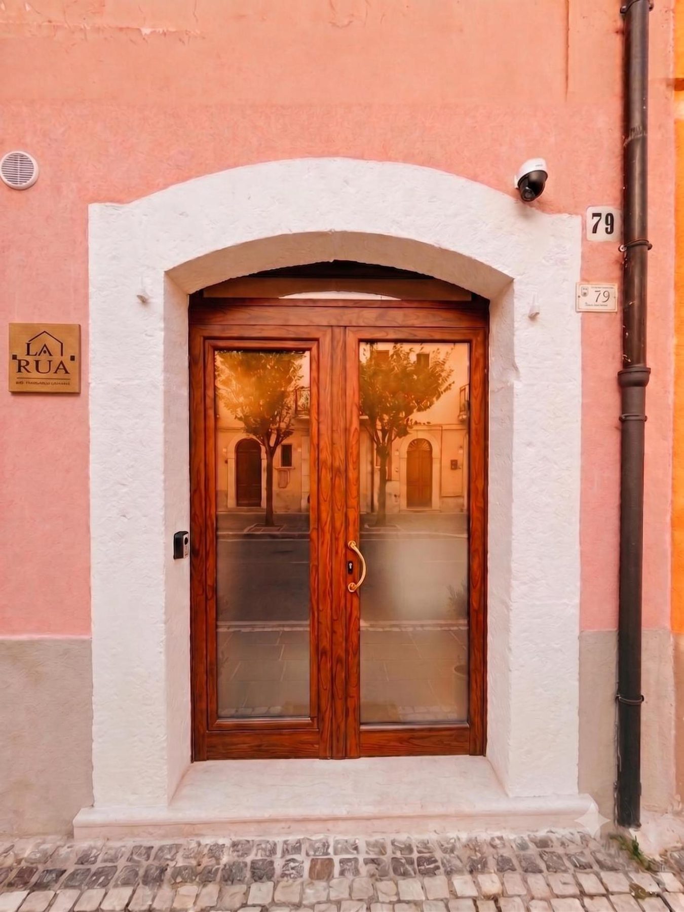The wooden front door at number 79, via XX Settembre