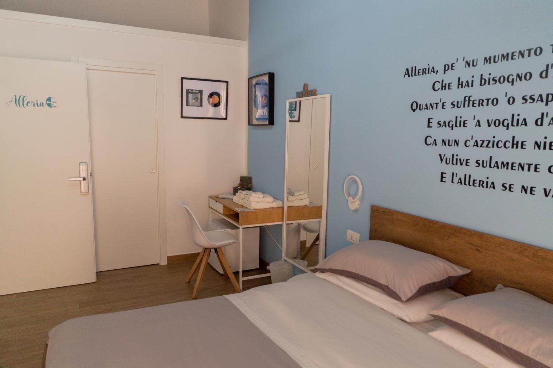 Alleria: the desk, the door with its name and the lettered wall