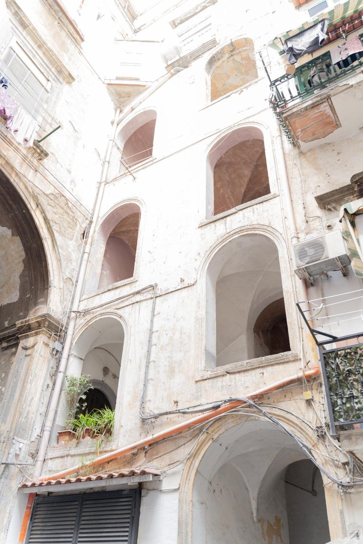The courtyard arches seen from below